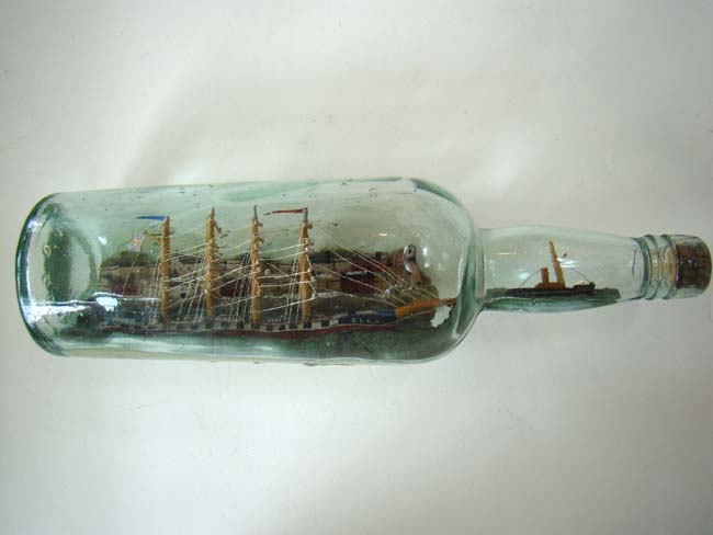 A Wonderful Antique Ship-in-a Bottle being lead into harbor by a pilot boat circa 1900 — image 2